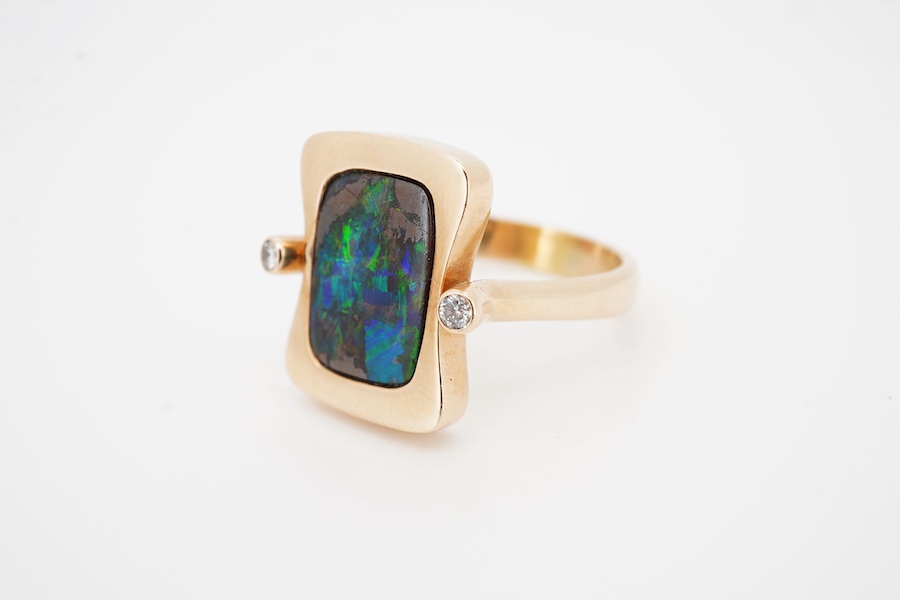 A modern Danish 14k, single stone black opal doublet? and two stone diamond set shaped rectangular ring, by Gabrielsen, size P, gross weight 9 grams. Condition - good